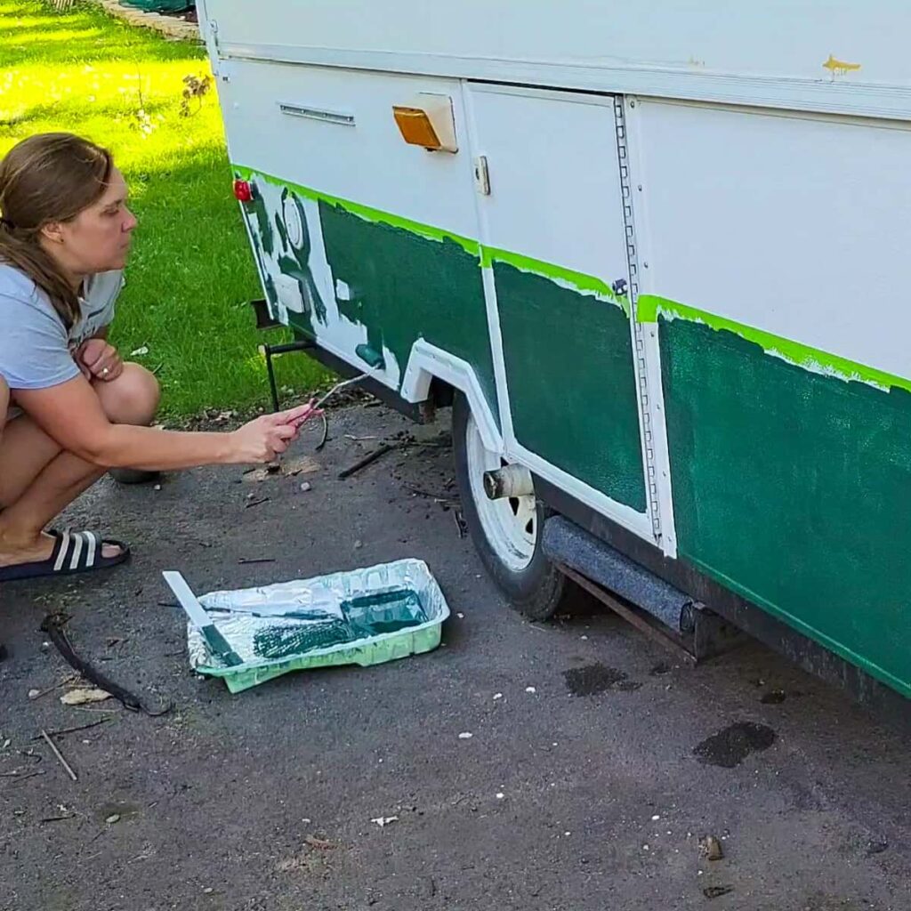 Inexpensive paint that works to paint the outside of a pop up camper or RV