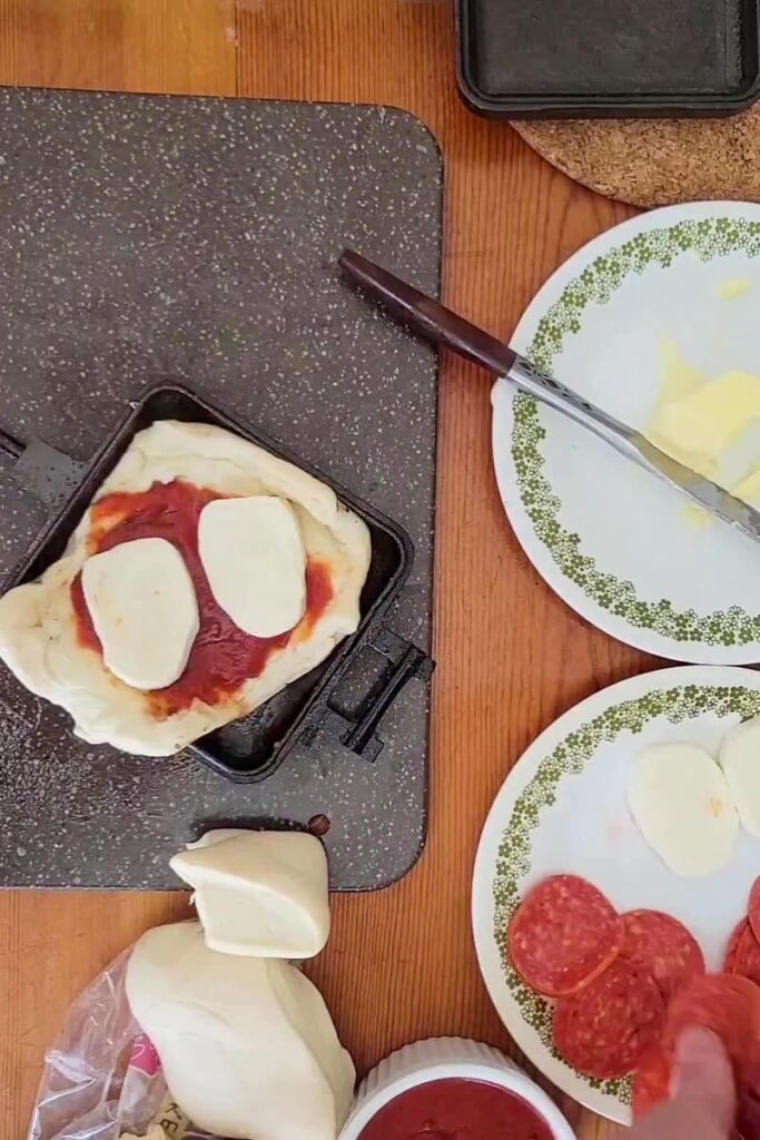 best way to make pizza while camping with this hobo pie pizza recipe