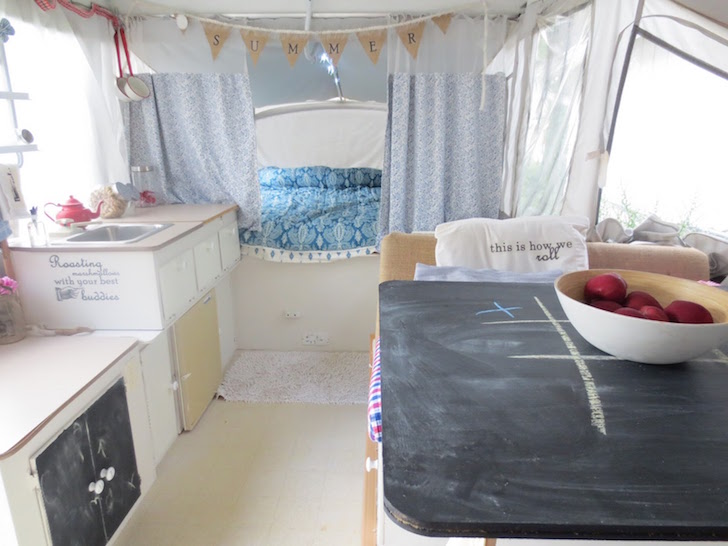 camper remodel with custom diy curtains and chalkboard paint table