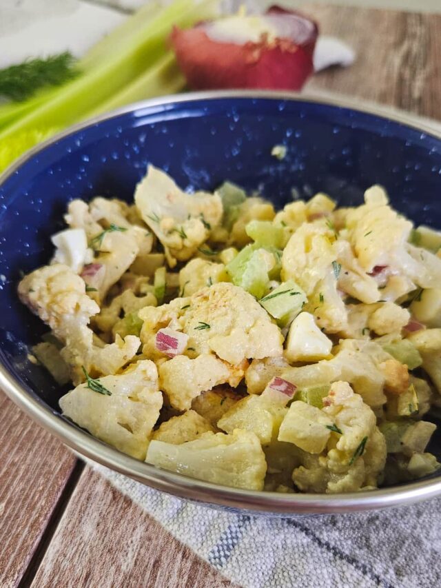 cauliflower potato salad with pickle, red onion, dill, celery for camping salad