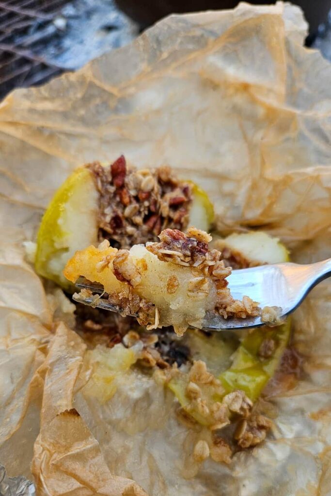 stuffed apples with pecans and oats over the campfire