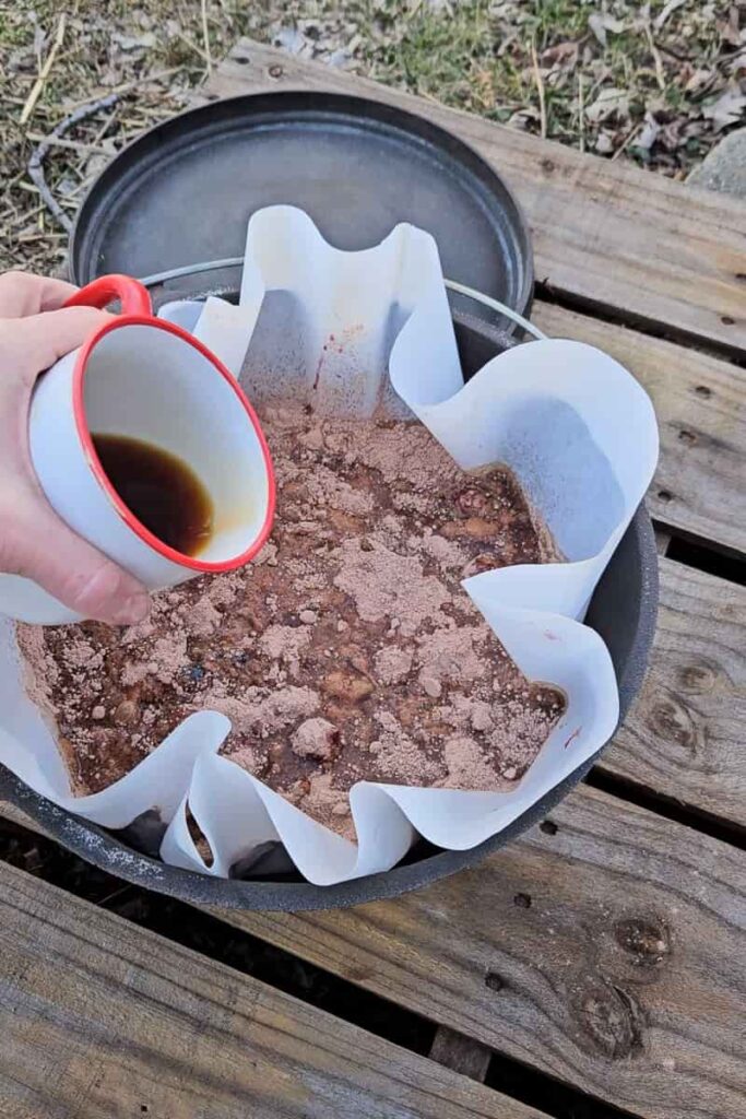 add coffee or dr. pepper to chocolate dump cake cooked over the fire while camping