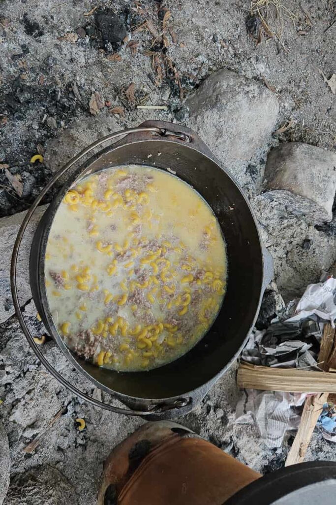 dutch oven mac and cheese with ground beef for camping dinner recipe