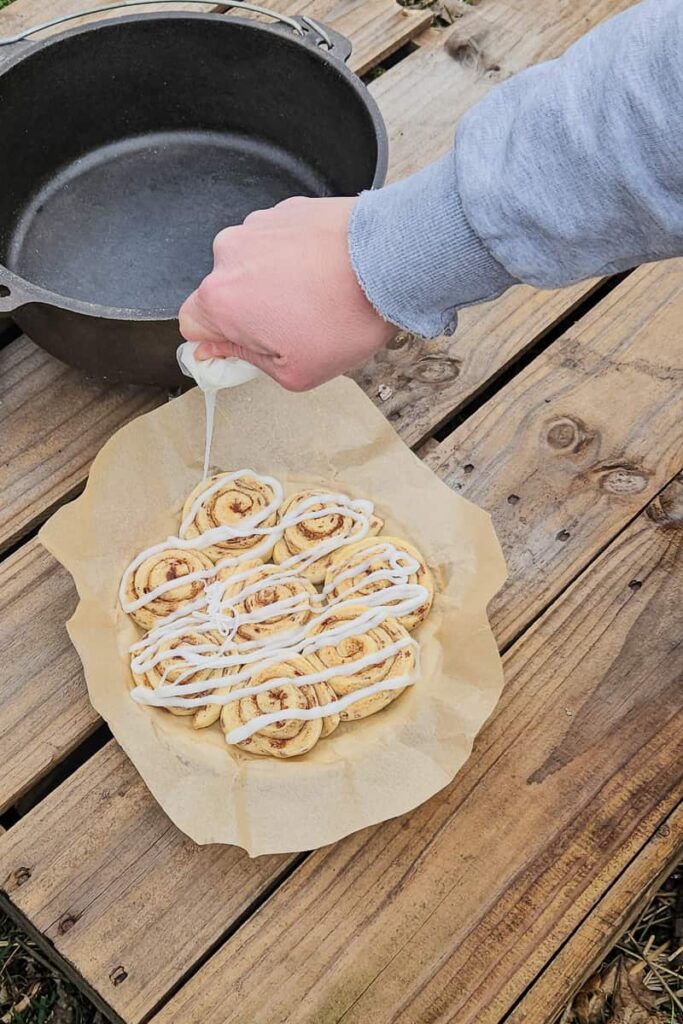 camping cinnamon rolls in a dutch oven