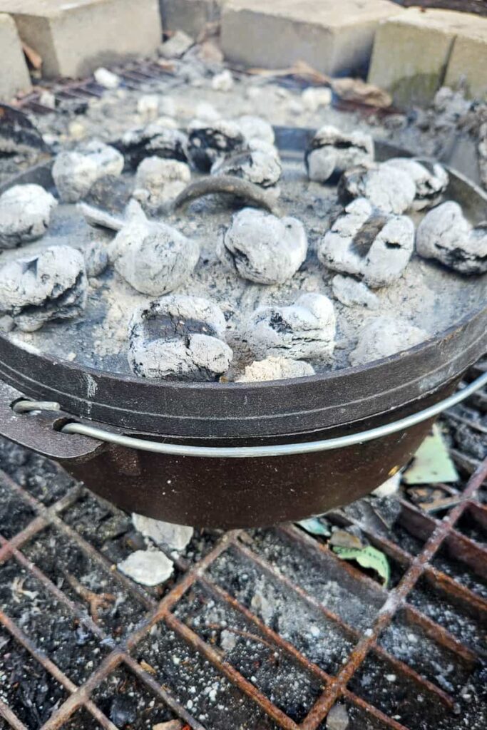 use a dutch oven to make cinnamon rolls while camping