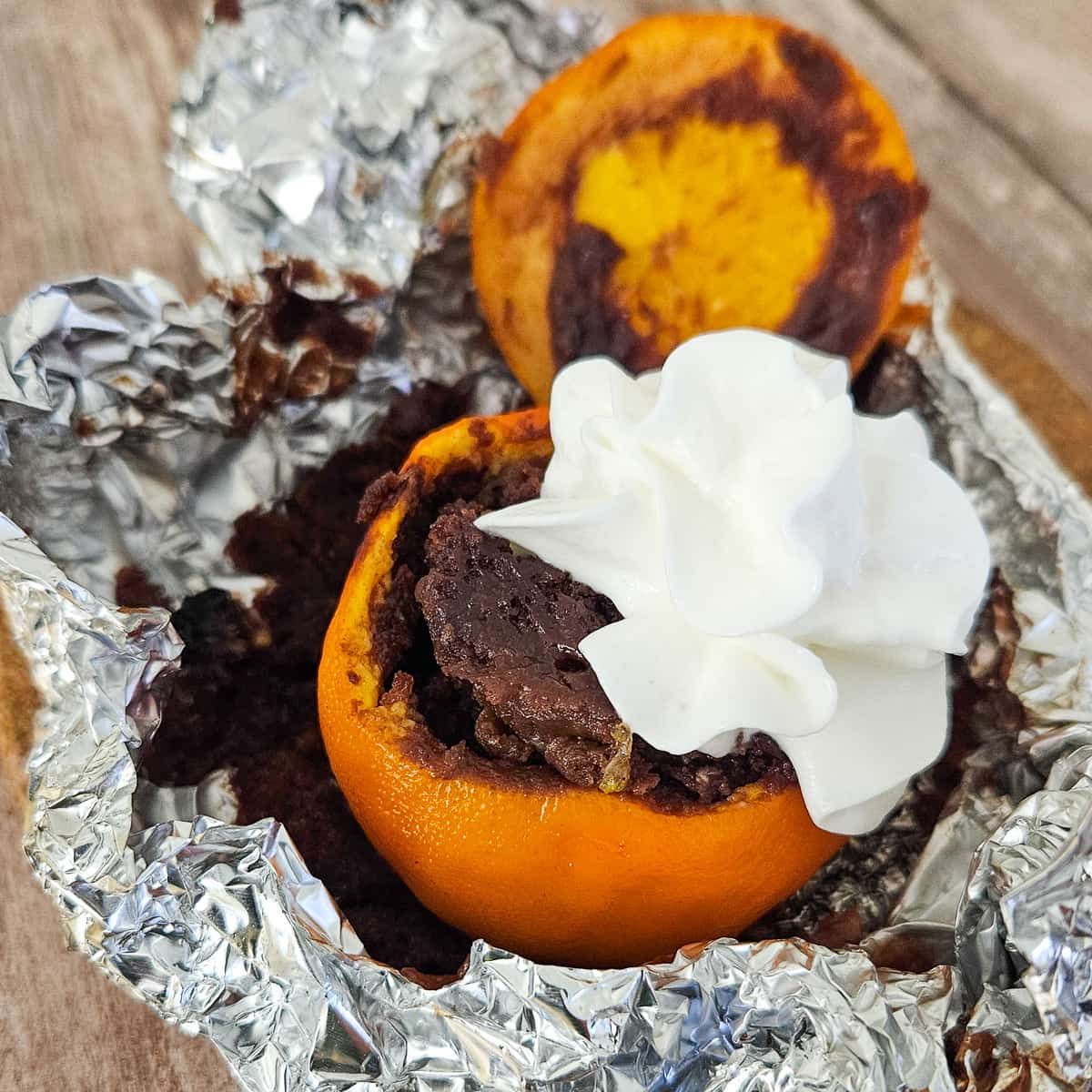 how to cook in an orange over the campfire