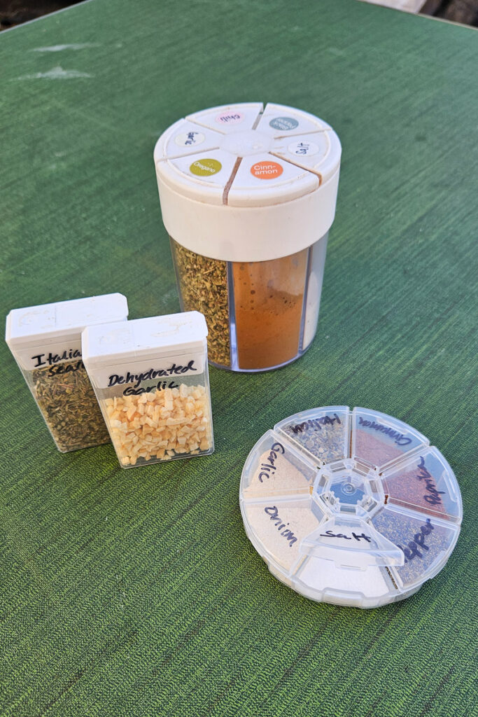 camping hack for storing spices in medicine containers or tic tac containers
