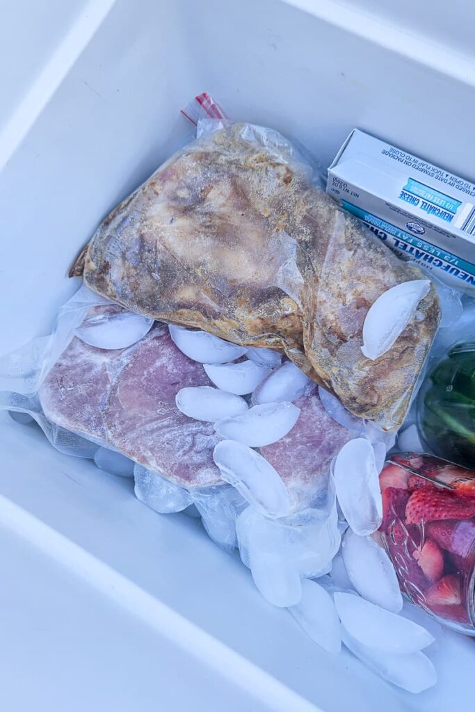 freeze meat and make ahead meals to pack in cooler for camping meals