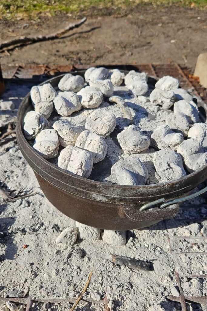 dutch oven brownies cooked over campfire coals without mixing