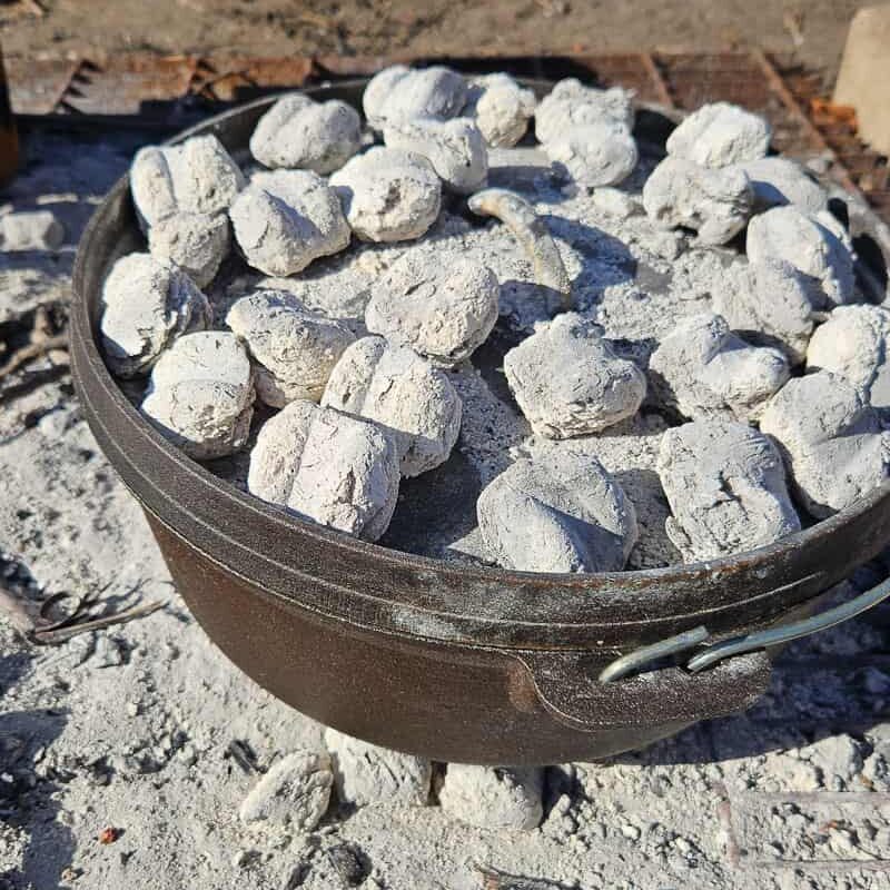 dutch oven brownies cooked over campfire coals without mixing
