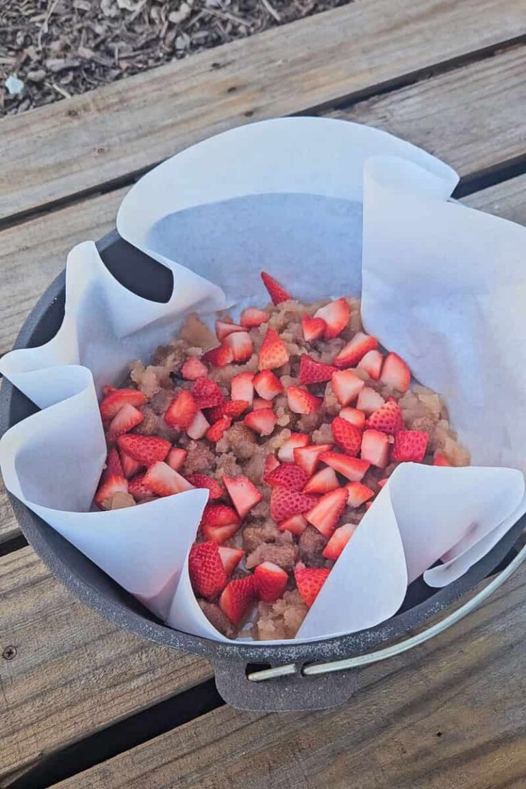 Dutch Oven Strawberry Cheesecake Dump Cake Refresh Camping