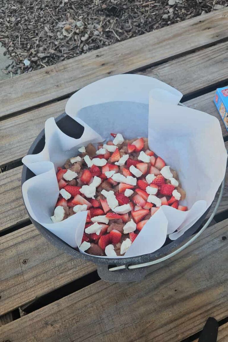 Dutch Oven Strawberry Cheesecake Dump Cake Refresh Camping