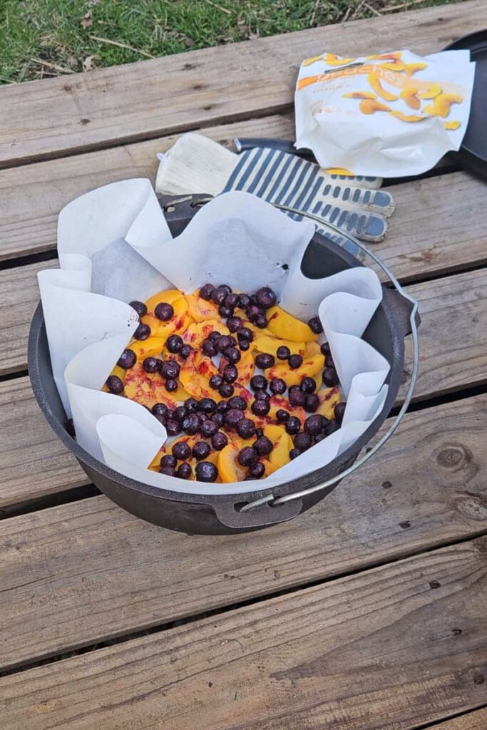 peach and blueberry in camping dump cake