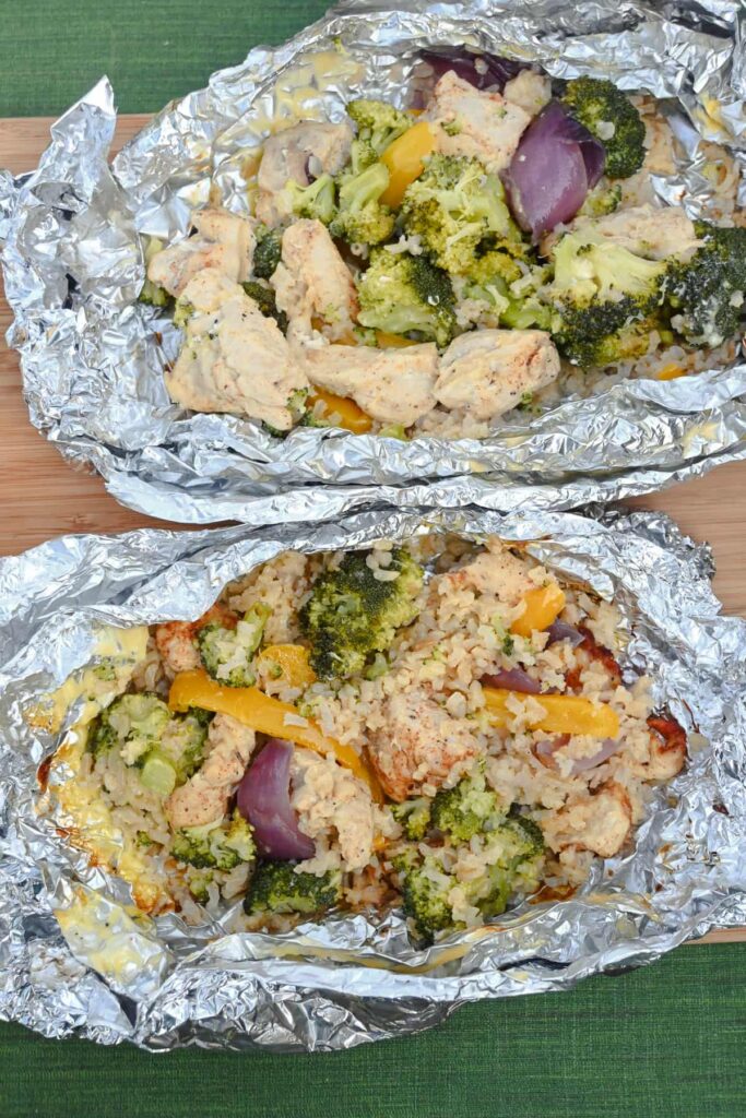 easy camping dinner recipe cooked over the campfire with chicken, broccoli and rice