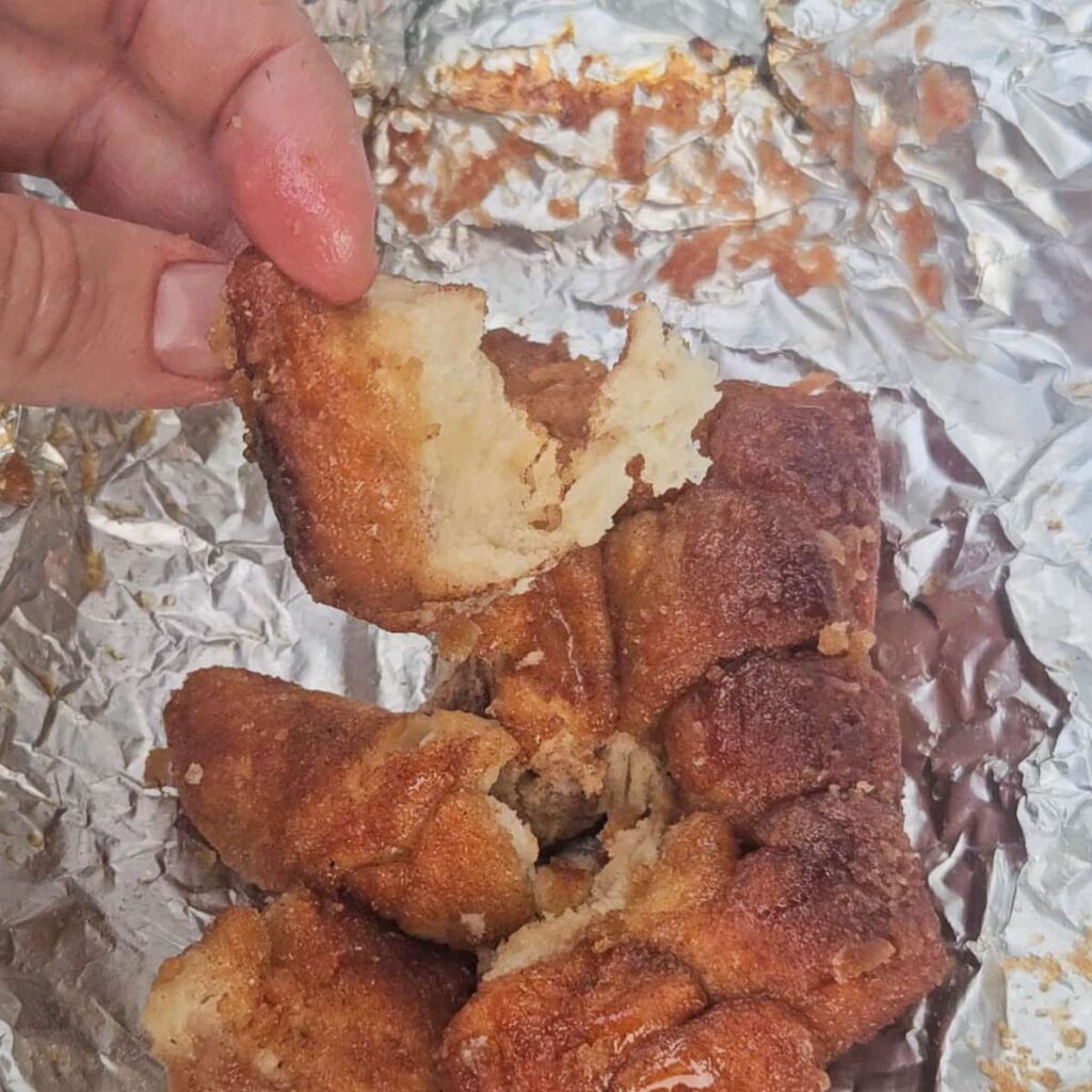 foil packet monkey bread recipe cooked over the campfire for easy camping dessert