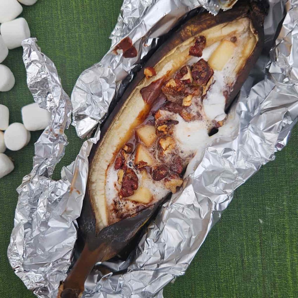 apple cinnamon banana boat variation with apples, pecans, granola, cinnamon and marshmallows
