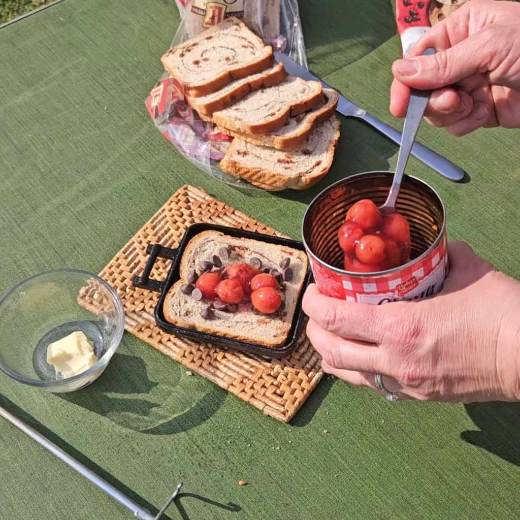 Use pie filling to make this easy pie iron dessert over the campfire.