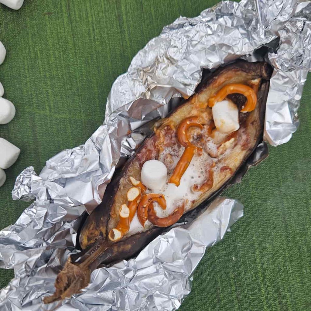 campfire banana boats with pretzels, Reeses and peanut butter