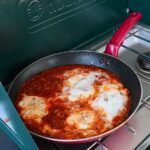 Spanish eggs are an easy one pot camping breakfast with chorizo, tomato sauce, peppers and onions